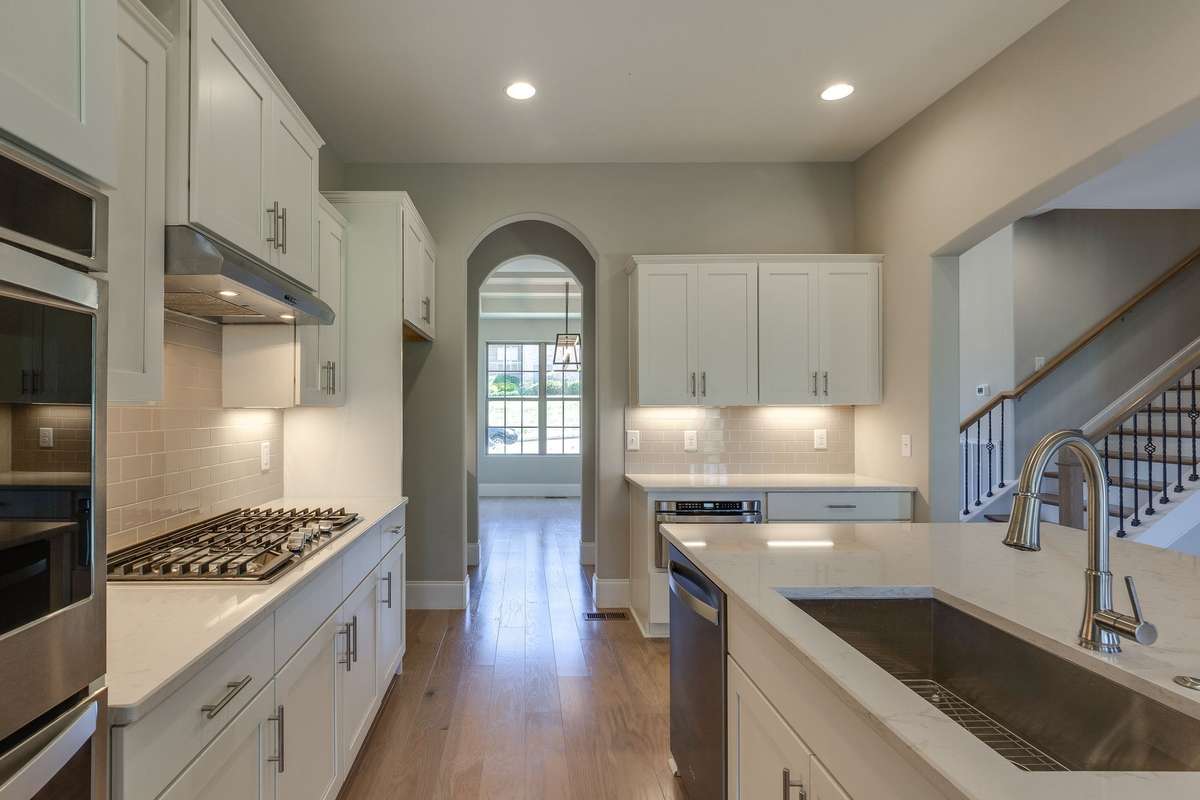 ** PHOTOS OF A SIMILAR HOME **