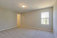 ** PHOTOS OF A SIMILAR HOME **