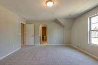 ** PHOTOS OF A SIMILAR HOME **