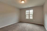 ** PHOTOS OF A SIMILAR HOME **