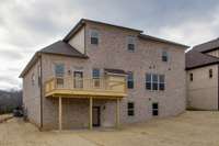 ** PHOTOS OF A SIMILAR HOME **