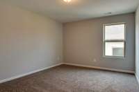 ** PHOTOS OF A SIMILAR HOME **