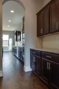 ** PHOTOS OF A SIMILAR HOME **