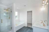 Primary Bathroom. Separate tub and shower shown. Option for an oversized shower and no tub for no additional cost!