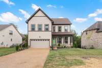 Charming curb appeal meets timeless elegance—welcome to your new home! 