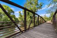 Beautiful bridge over the river at Billy Dunlop Park