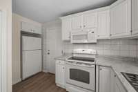 Range with built microwave!  New refrigerator!