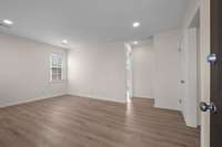 Nice open great room! the recessed lighting is awesome to avoid large bulky lamps, and keep the "open spacious" feel!