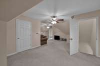 Flex room upstairs and floored walk-up attic storage.