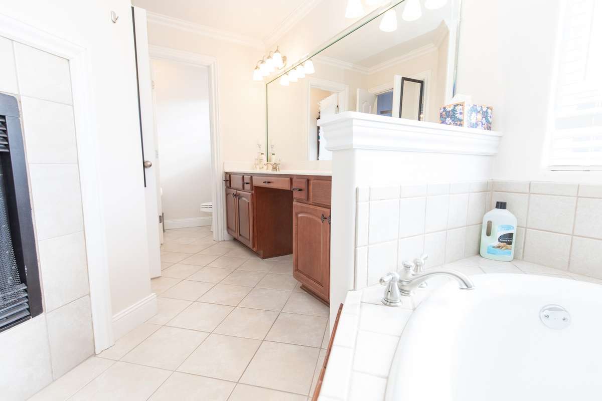 Can't you imagine sitting in the tub with the cozy fireplace going to wind down the day?