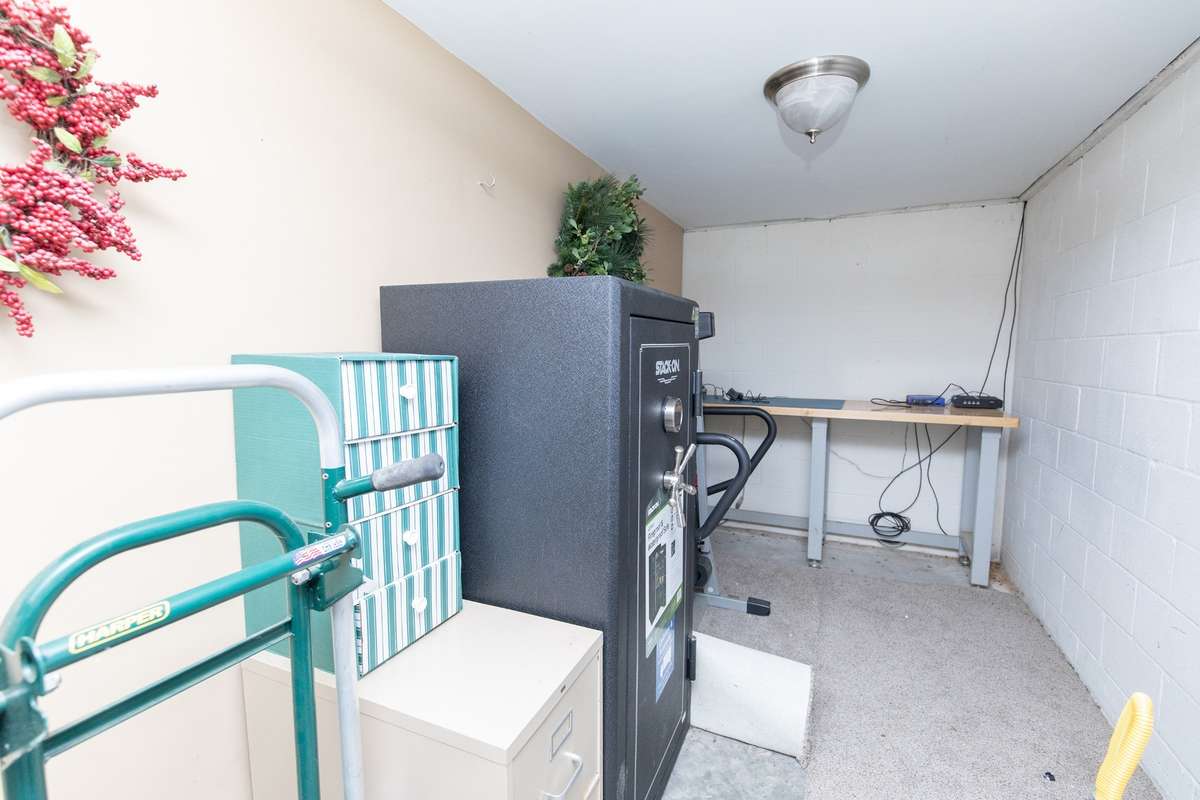 The man cave or workshop area is found on the left side of the staircase (coming down the stairs)