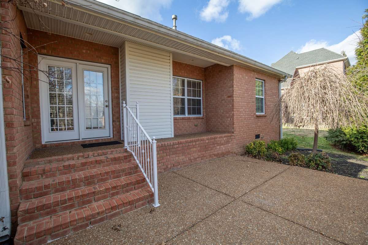 The back of the home showing off the 2 level patio
