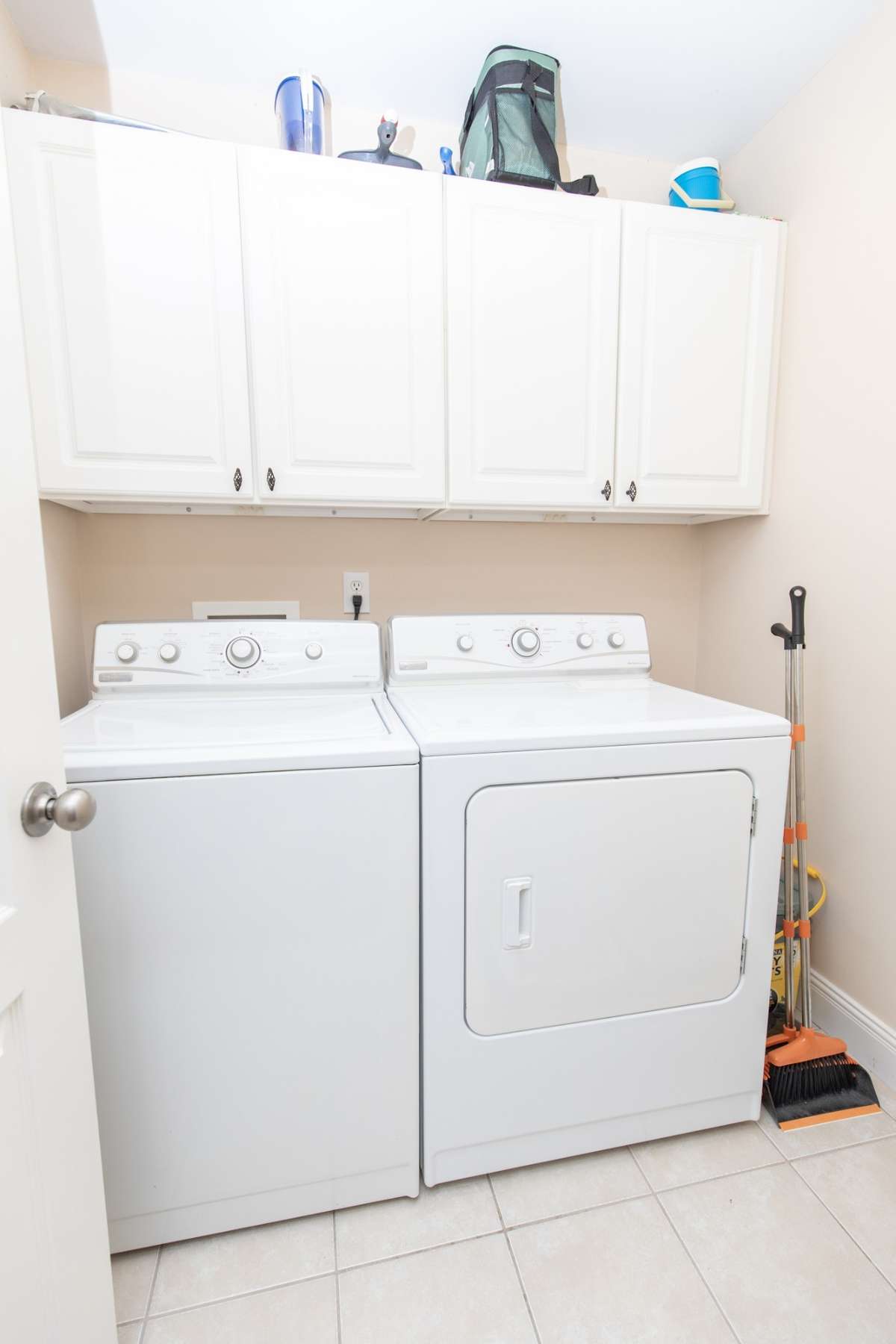 The utility room is located close to the primary suite