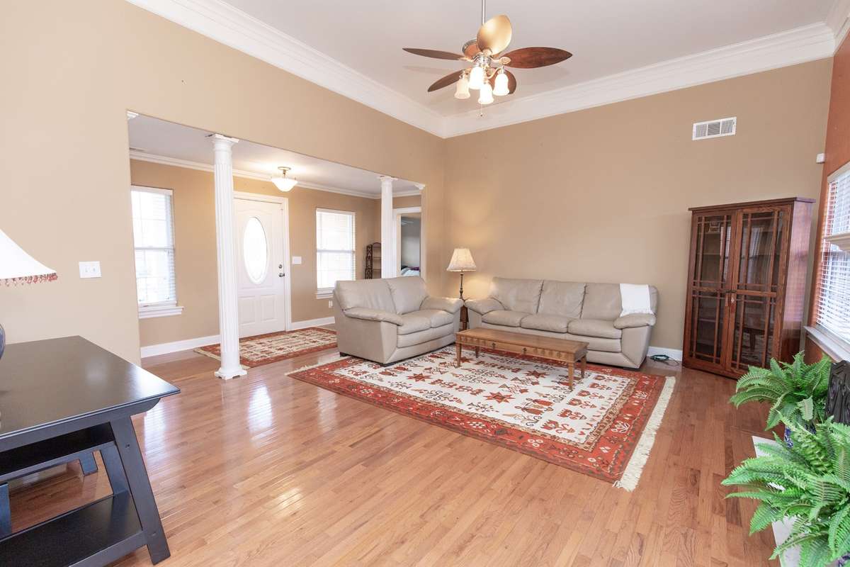 The family room is large and will hold all of your favorite furniture pieces