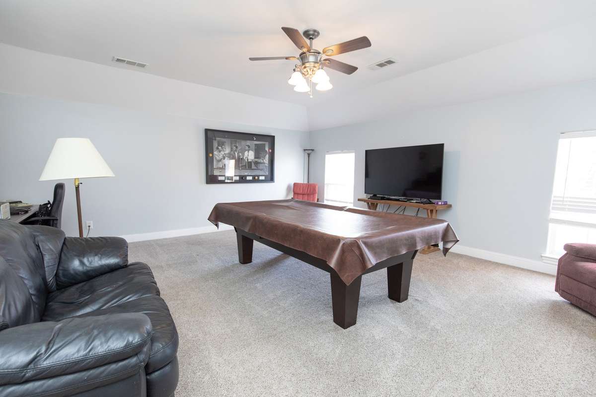 The bonus room is only 2 steps from the rest of the house