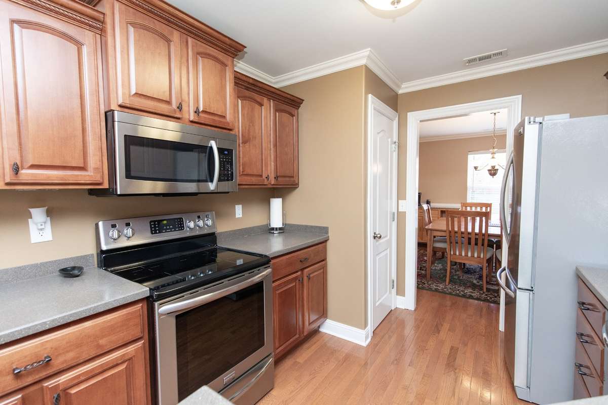 Beautiful appliances stay and this kitchen has a nice sized pantry