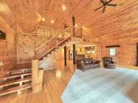 Open lodge style floor plan. Many parts of this home have been constructed with cedar from the property.