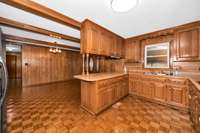 Kitchen- Wood flooring, wood cabinetry
