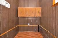 Laundry Room- wood cabinetry, washer & dryer connections