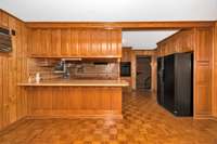 Kitchen- Wood flooring, wood cabinetry
