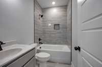 This is not a photo of the actual listing, but is another build of the same plan.