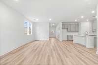 This is a photo of one of our model homes. Please know that some of the exterior and interior finishes, paint, and features may vary.