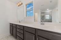 Quartz Countertops + Tile Shower in Primary Bath