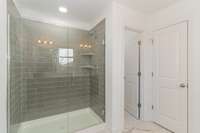 Quartz Countertops + Tile Shower in Primary Bath