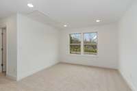 Upstairs, find a thoughtful loft for additional living space + three large bedrooms, two full baths & laundry room.