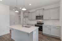 Don't miss the convenient drop zone off the garage!