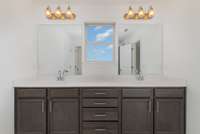 Quartz Countertops + Tile Shower in Primary Bath