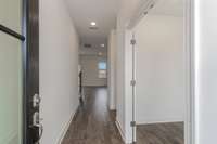 Discover an open-concept layout upon entry + thoughtful study/flex space at the front of the home.