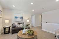 Upstairs, be greeted by a sizable loft with possibility for game room, gym or home theater.