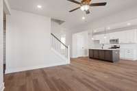 Picture of model home and not of actual home being built.  Colors and selections may vary.  Open railing on steps not available.