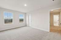 Bedroom #3 measures 15' x 11' and features a large walk-in closet, perfect for extra storage or organization.