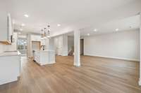 Located just off the kitchen, the breakfast space is filled with natural light and offers the perfect spot for casual meals or morning coffee. Its open layout provides a seamless flow to the kitchen and main living areas, ideal for everyday living.