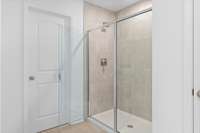 This is a photo of one of our model homes. Please know that some of the exterior and interior finishes, paint, and features may vary.