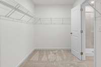 This is a photo of one of our model homes. Please know that some of the exterior and interior finishes, paint, and features may vary.