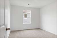 This is a photo of one of our model homes. Please know that some of the exterior and interior finishes, paint, and features may vary.