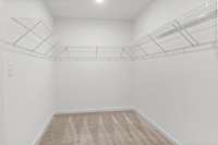 This is a photo of one of our model homes. Please know that some of the exterior and interior finishes, paint, and features may vary.