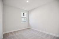 Bedroom #3, located close to a full bathroom, provides convenience and privacy, making it a cozy space for guests or flexible use.