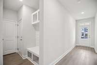 This convenient drop zone offers a dedicated space for coats, bags, and daily essentials, helping keep your home organized and clutter-free.