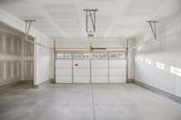 The two-car garage features an extra storage space that provides ample room for tools, seasonal items, and outdoor gear, helping keep your home organized.