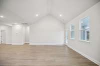 Step from the great room right onto the spacious covered patio, a wonderful spot for indoor/outdoor entertaining, relaxing, or savoring your morning coffee outdoors.