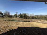 ***Photo taken on 12/12/25 to show current status of construction - pardon our dust***

View From Covered Rear Patio