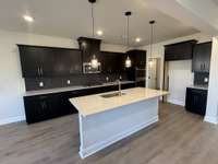 ***Photo taken on 12/12/25 to show current status of construction - pardon our dust***

Kitchen