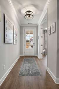 Stock Model Photo-Spacious Foyer w/Study on the Left as you enter home.