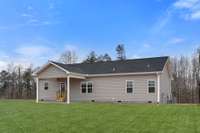 Covered back porch, perfect for relaxing or hosting! Photo of similar home.
