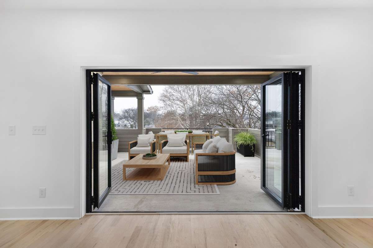 Virtually staged photo of access to rooftop deck