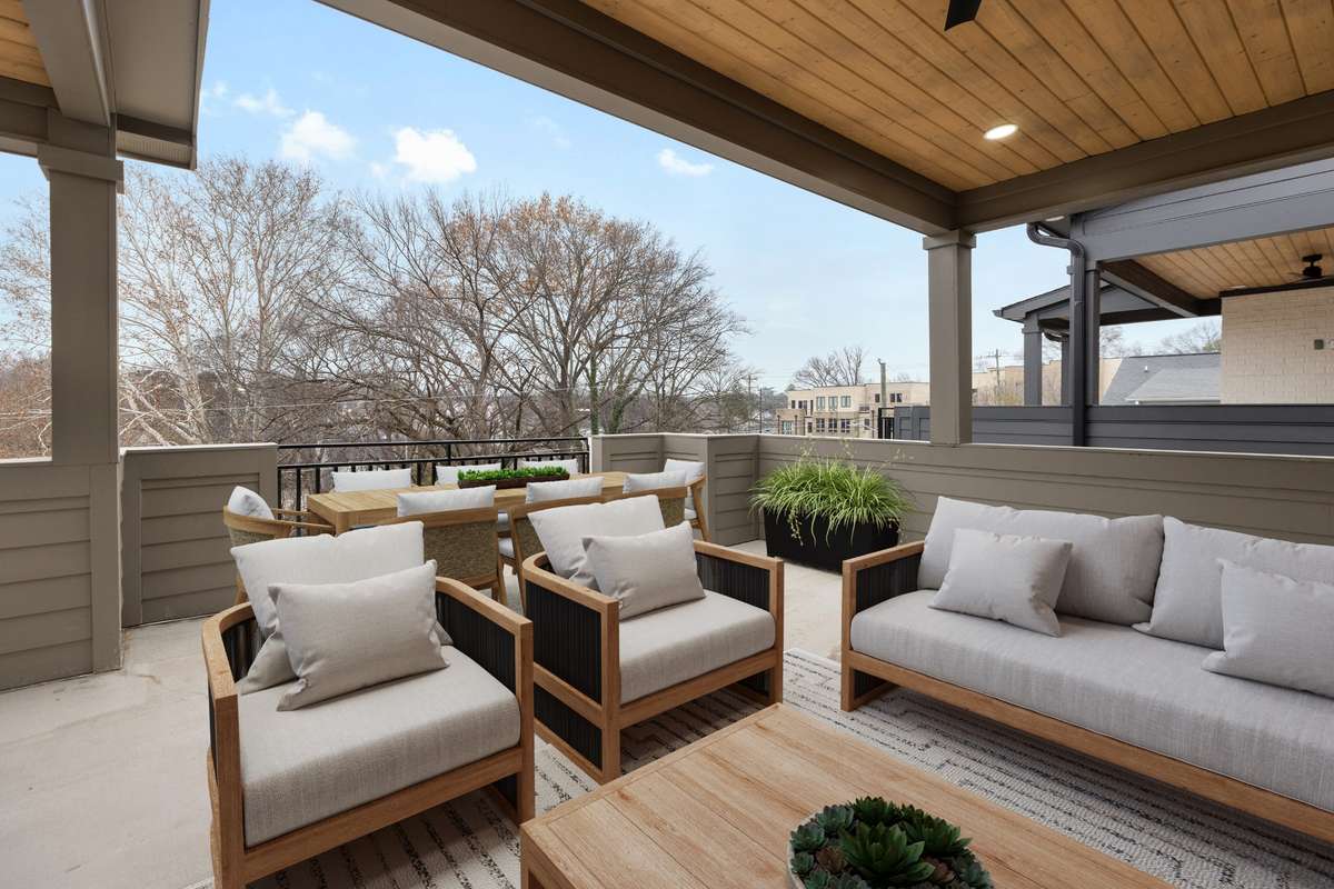 Virtually staged photo of access to rooftop deck